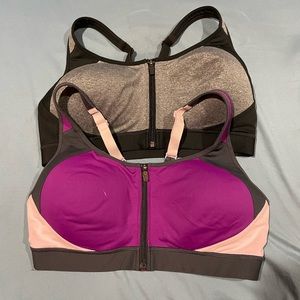 Two zip up sports bras